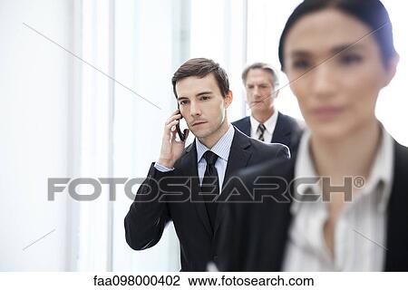 Business professionals on the move View Large Photo Image Stock Image - Business professionals on the move. Fotosearch