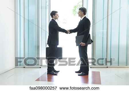 Businessmen shaking hands View Large Photo Image Stock Photo - Businessmen shaking hands. Fotosearch