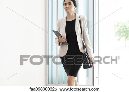 Businesswoman on the move View Large Photo Image Stock Photography - Businesswoman on the move. Fotosearch