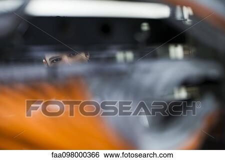 Computer technician scrutinizing networking equipment View Large Photo Image Stock Photograph - Computer technician scrutinizing networking equipment. Fotosearch