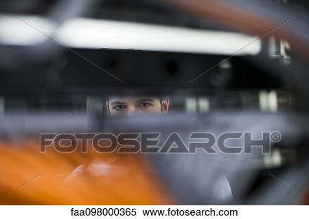 Computer technician scrutinizing networking equipment View Large Photo Image Stock Photography - Computer technician scrutinizing networking equipment. Fotosearch