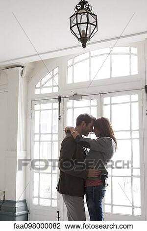 Couple embracing, silhouette View Large Photo Image Stock Image - Couple embracing, silhouette. Fotosearch