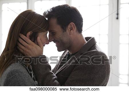 Couple embracing, silhouette View Large Photo Image Stock Photography - Couple embracing, silhouette. Fotosearch