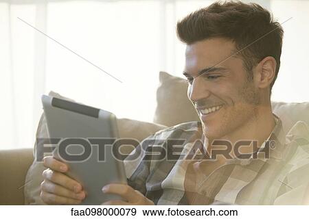 Digital tablets make video chatting with friends and loved ones easy View Large Photo Image Stock Photo - Digital tablets make video chatting with friends and loved ones easy. Fotosearch