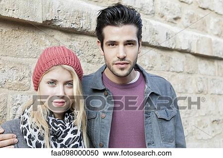 Stock Image - Fashionable young couple, portrait. Fotosearch