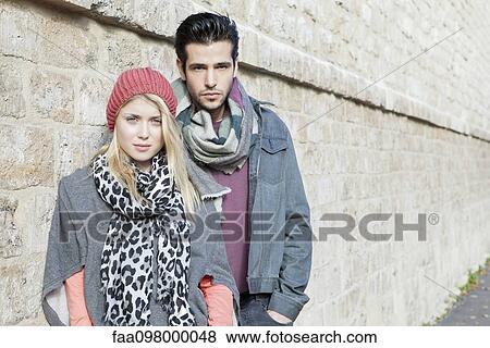 Stock Photo - Fashionable young couple, portrait. Fotosearch