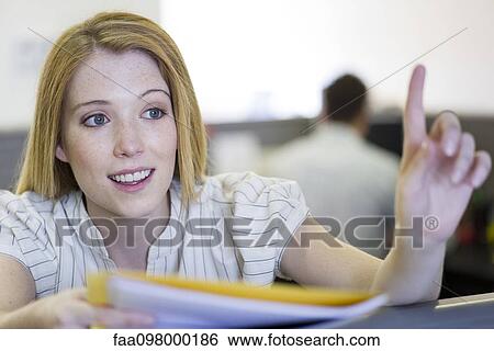 Stock Photograph - Internships provide valuable opportunities for recent graduates to gain work experience. Fotosearch