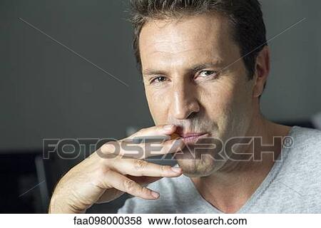 Man smoking electonic cigarette, portrait View Large Photo Image Stock Photo - Man smoking electonic cigarette, portrait. Fotosearch