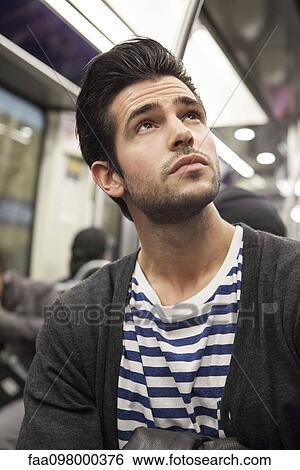 Subway commuter, potrait View Large Photo Image Stock Photograph - Subway commuter, potrait. Fotosearch