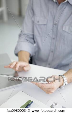 Using digital tablet with touch screen View Large Photo Image Stock Image - Using digital tablet with touch screen. Fotosearch