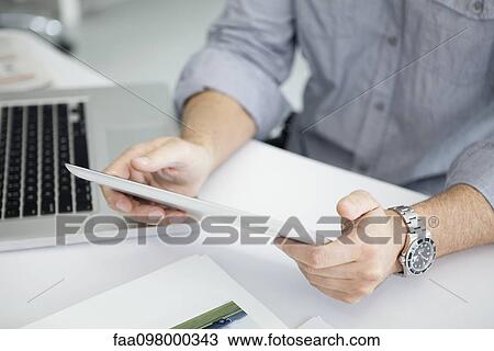 Using digital tablet with touch screen View Large Photo Image Stock Image - Using digital tablet with touch screen. Fotosearch