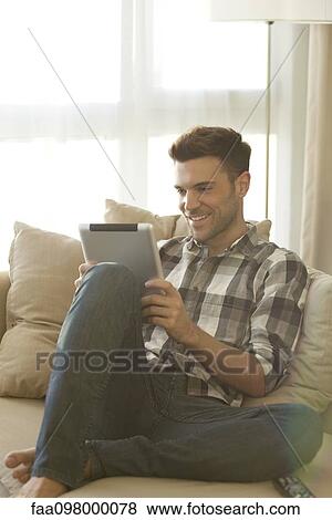 Wireless devices make staying in touch with others easier than ever View Large Photo Image Stock Photo - Wireless devices make staying in touch with others easier than ever. Fotosearch