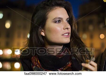 Woman enjoying smoke outdoors View Large Photo Image Stock Photo - Woman enjoying smoke outdoors. Fotosearch