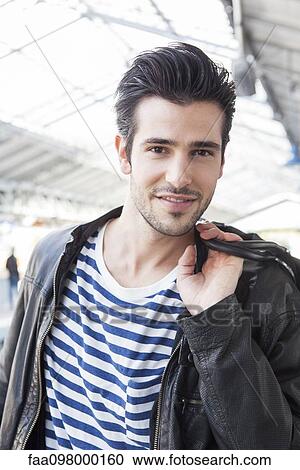 Stock Image - Young man, portrait. Fotosearch