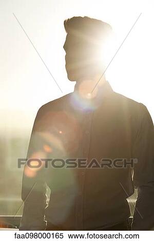 Stock Photography - Young man, silhouette. Fotosearch