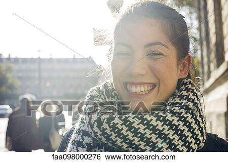 Young woman outdoors, portrait View Large Photo Image Stock Photograph - Young woman outdoors, portrait. Fotosearch