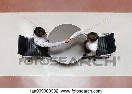 Businessmen shaking hands View Large Photo Image Stock Image - Businessmen shaking hands. Fotosearch