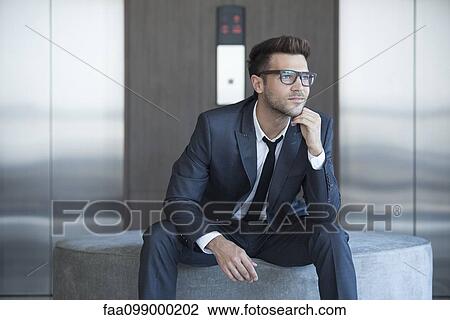 Stock Image - Fashionable young businessman, portrait. Fotosearch