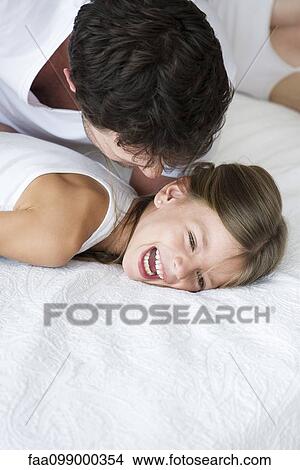 Father playing with daughter View Large Photo Image Picture - Father playing with daughter. Fotosearch