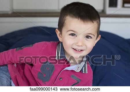 Little boy relaxing at home, portrait View Large Photo Image Stock Image - Little boy relaxing at home, portrait. Fotosearch