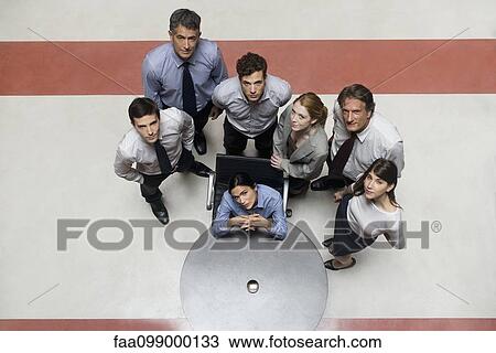 Stock Image - Teamwork is required to bring innovative business ideas to fruition. Fotosearch