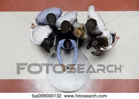 Stock Image - Teamwork is required to develop innovative business ideas. Fotosearch