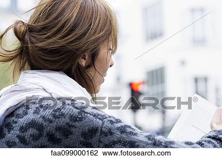 Tourist using guidebook View Large Photo Image Stock Image - Tourist using guidebook. Fotosearch