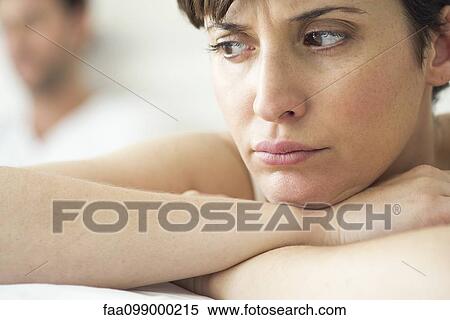 Woman angry and resentful following dispute with husband View Large Photo Image Stock Photography - Woman angry and resentful following dispute with husband. Fotosearch