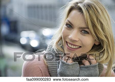 Woman dressed warmly with knit gloves and scarf View Large Photo Image Stock Image - Woman dressed warmly with knit gloves and scarf. Fotosearch
