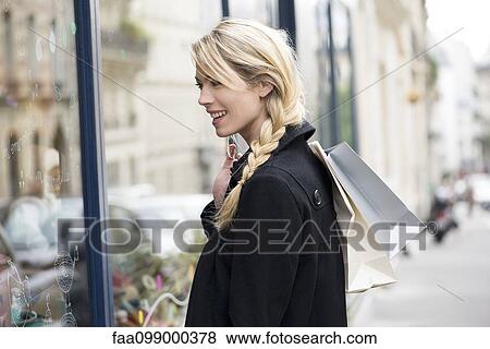 Stock Photo - Woman window shopping. Fotosearch