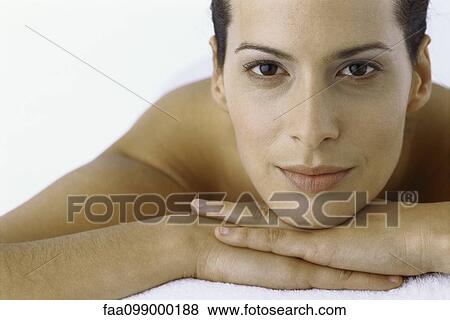 Woman with head resting on hands, portrait View Large Photo Image Stock Photo - Woman with head resting on hands, portrait. Fotosearch