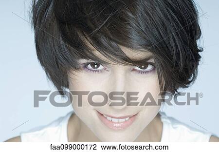 Stock Image - Woman with short hair, portrait. Fotosearch