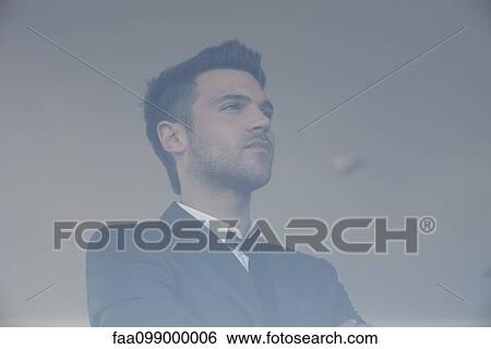 Stock Photograph - Young businessman, portrait. Fotosearch
