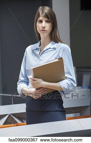 Stock Photo - Young businesswoman, portrait. Fotosearch