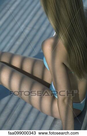 Stock Image - Young woman in bikini. Fotosearch