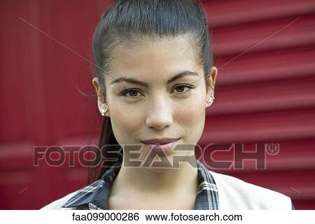 Stock Photograph - Young woman, portrait. Fotosearch