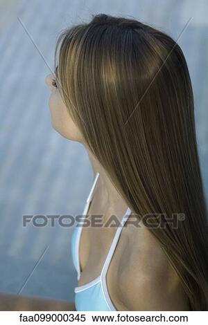 Young woman with long hair wearing bikini top, cropped View Large Photo Image Stock Photography - Young woman with long hair wearing bikini top, cropped. Fotosearch