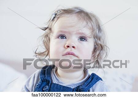 Baby girl looking up, portrait View Large Photo Image Stock Image - Baby girl looking up, portrait. Fotosearch
