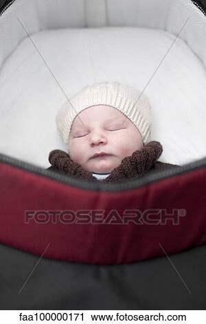 Baby sleeping in pram View Large Photo Image Stock Image - Baby sleeping in pram. Fotosearch