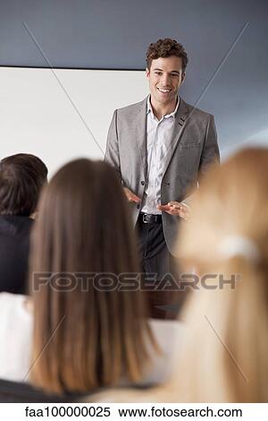 Businessman leading business meeting View Large Photo Image Stock Photography - Businessman leading business meeting. Fotosearch