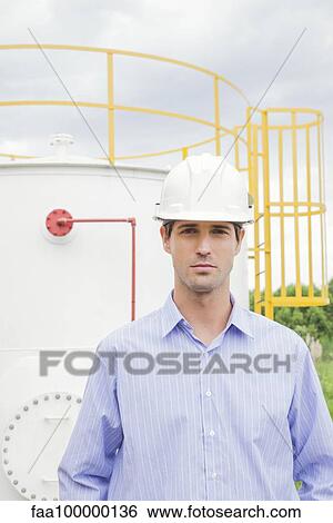 Engineer at industrial site, portrait View Large Photo Image Stock Photograph - Engineer at industrial site, portrait. Fotosearch