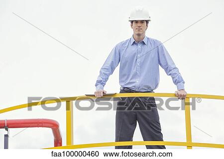Engineer at industrial site View Large Photo Image Stock Image - Engineer at industrial site. Fotosearch