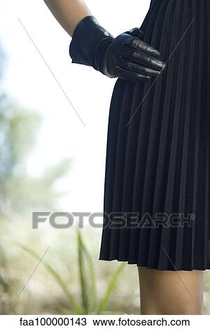Gloved hand on hip View Large Photo Image Stock Image - Gloved hand on hip. Fotosearch