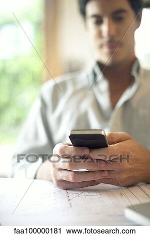 Man using smartphone View Large Photo Image Stock Image - Man using smartphone. Fotosearch