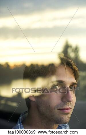 Man watching sunrise View Large Photo Image Stock Photo - Man watching sunrise. Fotosearch