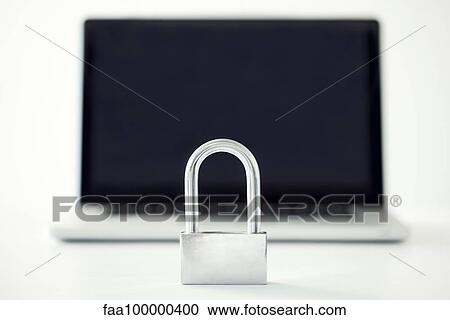 Stock Image - Padlock in front of laptop computer representing internet security. Fotosearch
