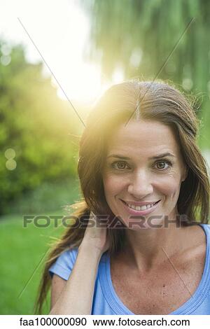 Stock Image - Woman, portrait. Fotosearch
