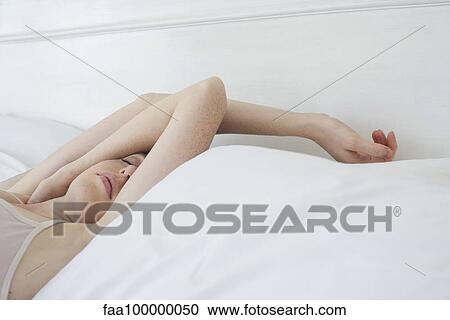 Woman sleeping View Large Photo Image Stock Image - Woman sleeping. Fotosearch