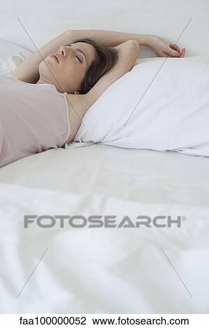 Stock Image - Woman sleeping. Fotosearch
