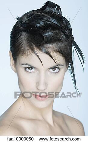 Woman with spiky hairstyle, portrait View Large Photo Image Stock Image - Woman with spiky hairstyle, portrait. Fotosearch